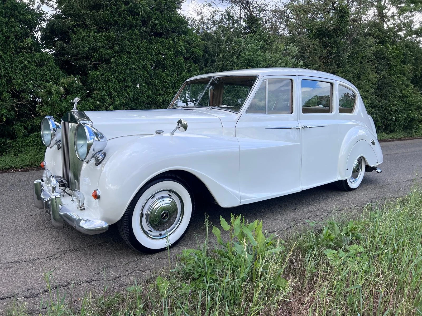Lady Bella Chauffeur classic white wedding car front angle